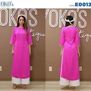 NEW Ao dai cach tan suong.
Vietnamese modern dress shifted.